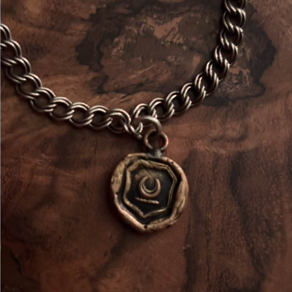 Pyrrha Sterling Silver bracelet with Bronze Talisman New Beginnings